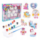 A Set Of Ceramic Figures With Paints and Brushes. Unicorn Shapes A Set Of Ceramic Figures With Paints and Brushes. Unicorn Shapes